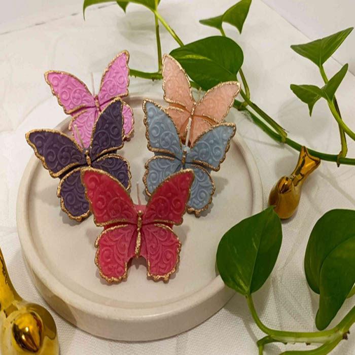 شمع دکوری پروانه لبه طلایی